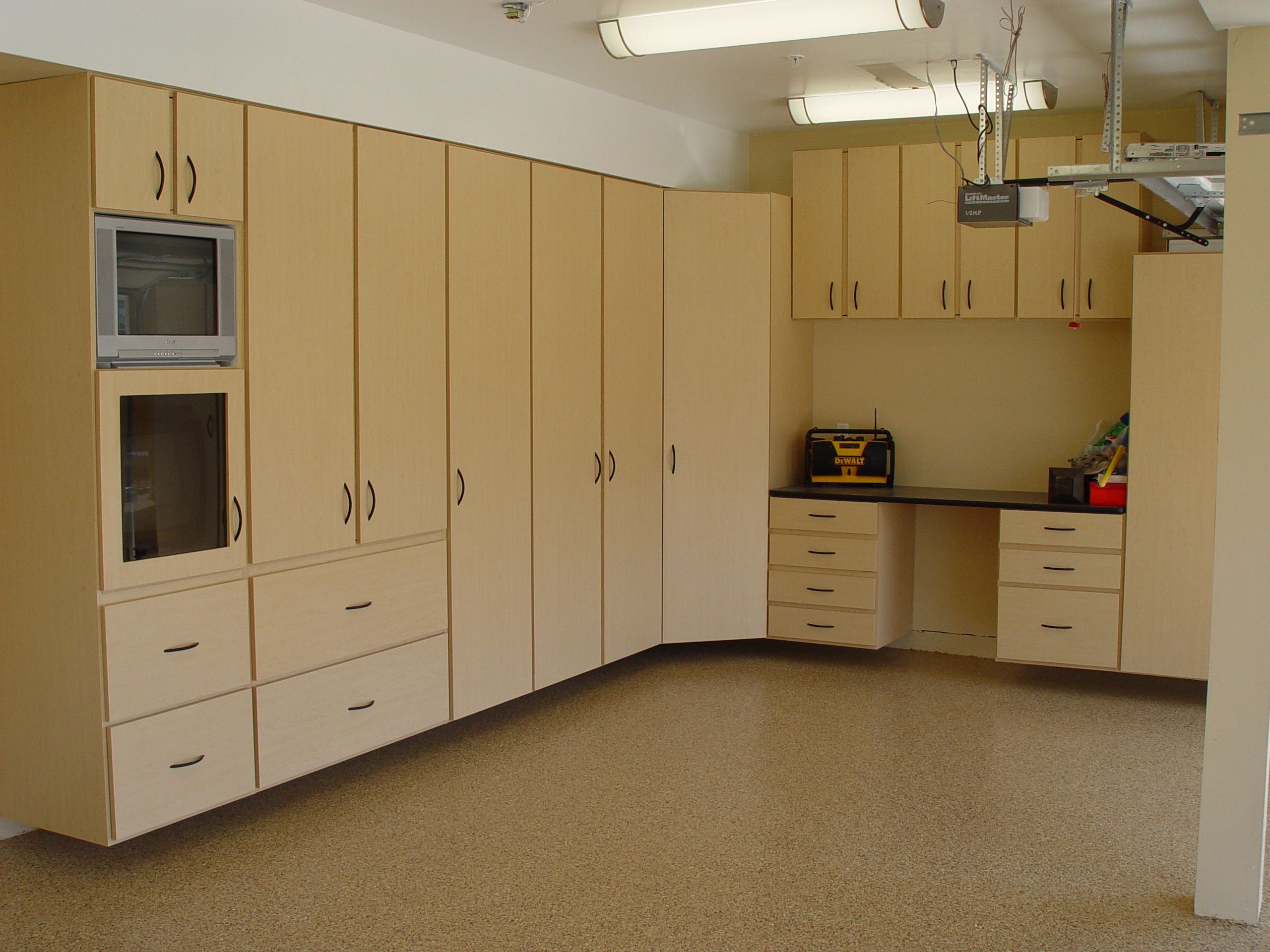 Maple-finish garage cabinet system in Lafayette